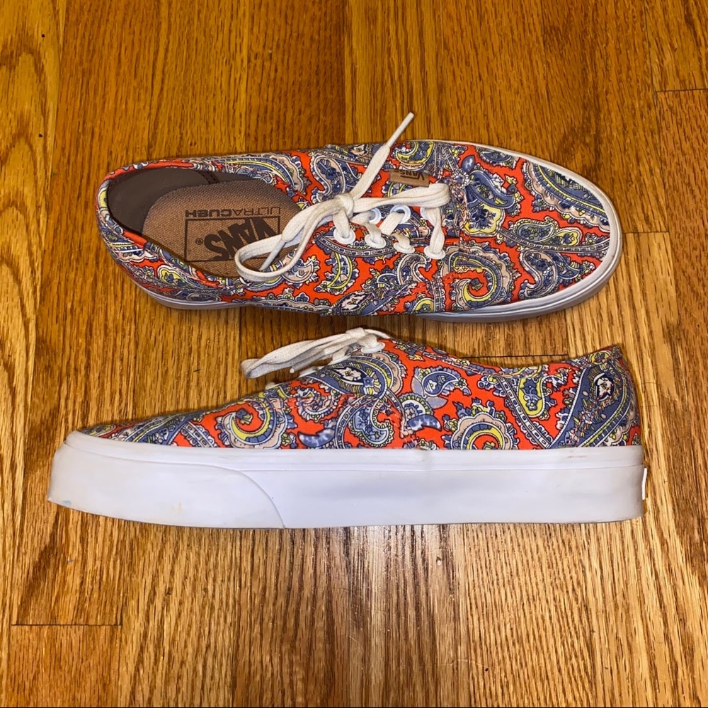 Blue and orange designed Vans, barely worn